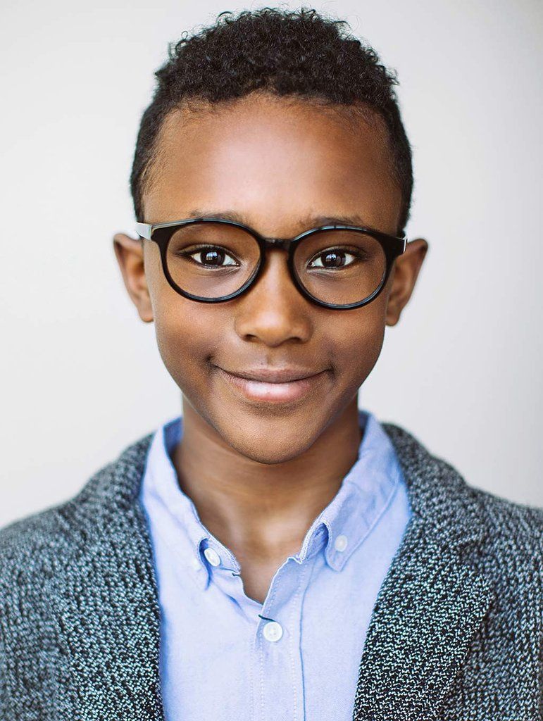 Young boy with glasses.